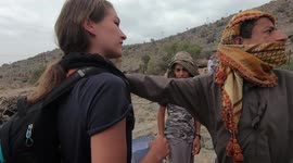 Girl goes back into mountains (Oman) two years later to find old man who helped her- his reaction is priceless