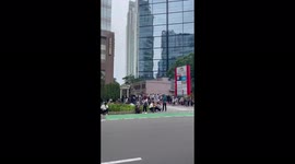 Workers evacuate buildings and head onto streets as 6.7 earthquake hits Jakarta