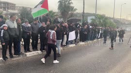 People shout slogans during a protest in Umm al-Fahm in solidarity with Bedouin communites in the Negev Desert