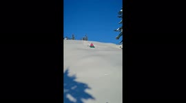 Riding on a rubber boat for fishing from the snowy mountains