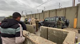 Israeli soldiers close the main entrance between Jenin and Nablus