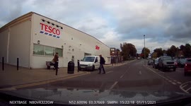 Learner biker checking out a young skirt across the road almost gets wiped out