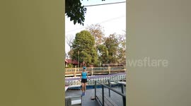 Floor COLLAPSES into river while woman records herself skipping