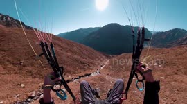 Speed-flyer races down Austrian Alps mere inches away from impact