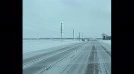 Amazon delivery truck gets blown off the road during Highwinds and icy roads in Minnesota