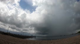 Pop Up Thunderstorm Clouds Crossing The Kentucky Lake With Rain Shaft Occuring Near LBL In Grand Rivers, KY