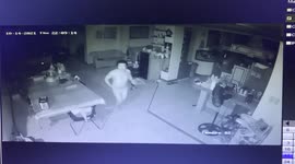 Man doesn't leave his booze behind when he flees a room during earthquake in the Philippines