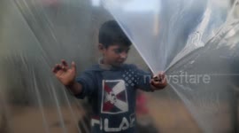 Gazans struggle to stay warm, with little electricity to heat ramshackle homes