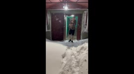 The guy decided to jump into a snowdrift and swam in the snow