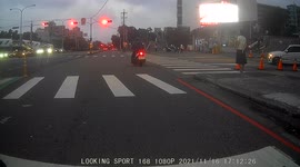 INSTANT KARMA: Impatient moped rider skips a red light in front of traffic enforcement (Dashcam Video)