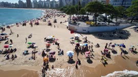 How about going to the beach in a sunny day in Brazil with a lot of peaple enjoying