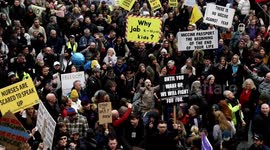 Hundreds march through shopping centre in Manchester for anti-vaccine protest