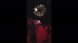 fantastic fire works at beach party at the shores of indian ocean