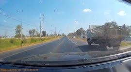 Driver dodges two trucks to avoid lethal accident