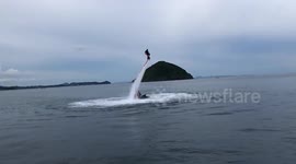 Tourist rides flyboard like pro in Thailand