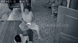 Protective brother saves sister from falling from table