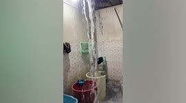 Heavy rainwater pour into toilet during thunderstorm in Thailand