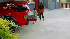 Boy faceplants on pickup truck tailgate during playtime