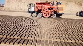 Indian manufacturer builds automatic brick making machine that churns out 300 per minute