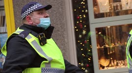 TSG OFFICER AND PROTESTER COMMUNICATE OVER VIEWS ON MASK - 