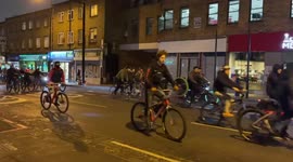 Street peddlers: More than a hundred cyclists ride through Camden Town, London