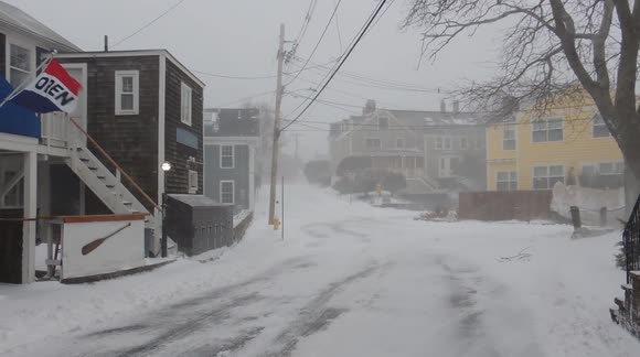 Storm conditions in Massachusetts as blizzard blankets area with snow