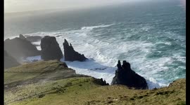 Feel the power of Storm Malik as huge waves crash into the cliffs of Northern Ireland