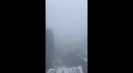Gusts of wind and snow in Downtown Boston during Storm Kenan from the 37th Floor