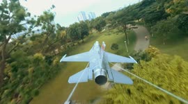 Drone pilot builds miniature 'F-16 fighter plane' to do stunts over park in Singapore