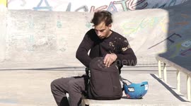 A Palestinian youth Hani al-Hajjar, 21, performs moves during a skate roll training, in Gaza city