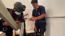 Hero rescue volunteers rappel down three-storey building to save kittens