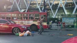 Sword-wielding Mercedes driver releases live cobras on busy road in Thailand