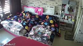 Electric fan comes loose while mother and daughter lie on their beds