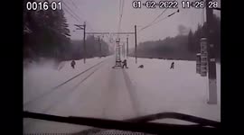 Team of workers repairing railway flee as train fails to stop in western Russia