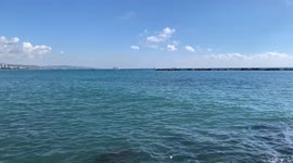 Cruise ships stand off the coast of Cyprus. View from the shore to the cruise ships.