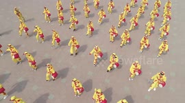 Primary school students perform the intangible cultural heritage in Zhangjiakou, China