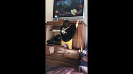 Sebastian climbing the closet then getting scared to get down