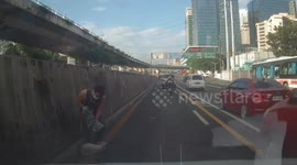 Kind driver rescues dog stranded on busy highway and reunites her with her owner