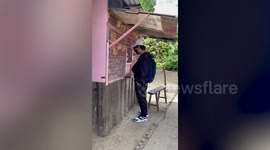 Son returning home for first time in two years surprises father by pretending to be customer in his store