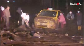 Ecuador flash floods: Car stuck in torrent of mud during heavy rain
