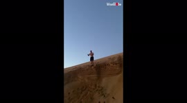 'Freerunner EATS DIRT while attempting a double gainer down a sand slope'