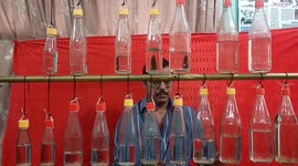 Indian man makes musical instruments out of glass bottles, terracotta and tiles