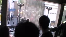 Protesters yell as military arrests a protester during anti-coup protests in 2014