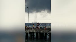 Giant waterspout almost hits fishing boats in the Philippines