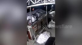 Snowdrift pushes woman off house roof in China