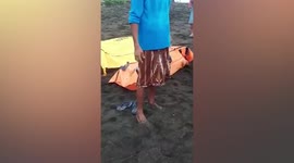 Eleven worshippers washed out to sea and drown at beach ritual in Indonesia