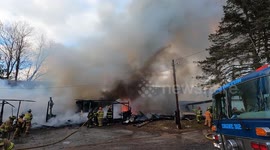 Large, explosive fire destroys mobile home and garage in Zerbe Township, Pennsylvania