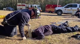 Incredible moment firefighters rescue dog trapped in 15-foot hole