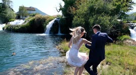 the bride tried to jump from the boat to the island to take photos and was about to fall, funny