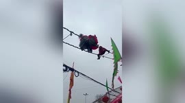 Lion dancers escape serious injuries after falling 7 feet down platform in China